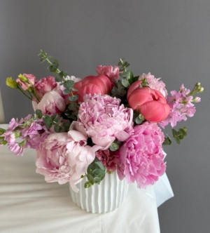 peonies in a ceramic vase